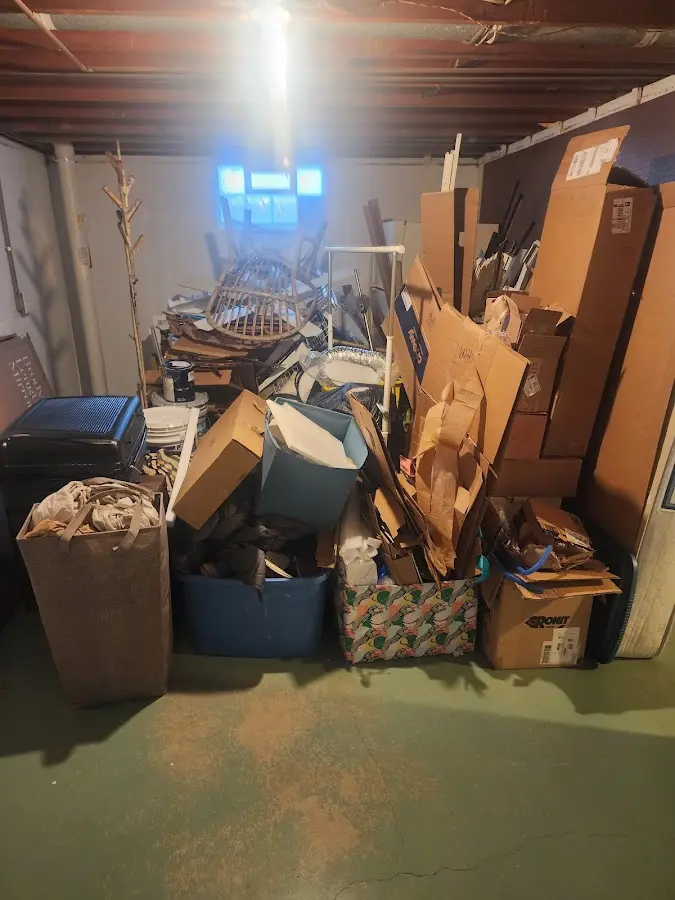 Roll-off dumpster container at job site for Yard Waste Dumpster Rental in Winchendon